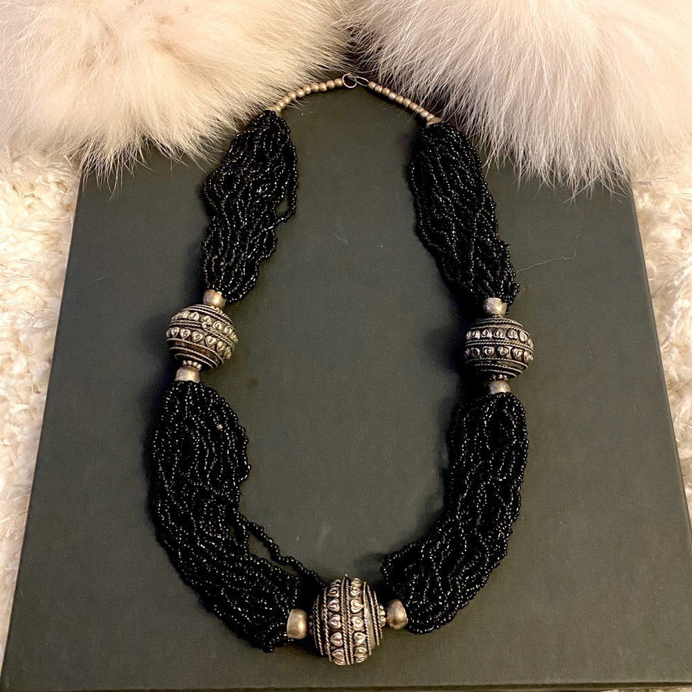 Black Beaded Multi-strand Necklace with Metal Detailing.